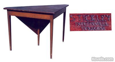 The table was made by L. & J.G. Stickley in Fayetteville, New York. 